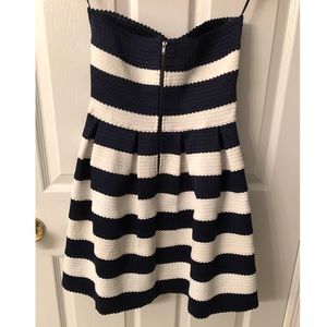Navy and blue striped strapless dress.
